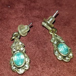 Vintage gold earrings with blue gem